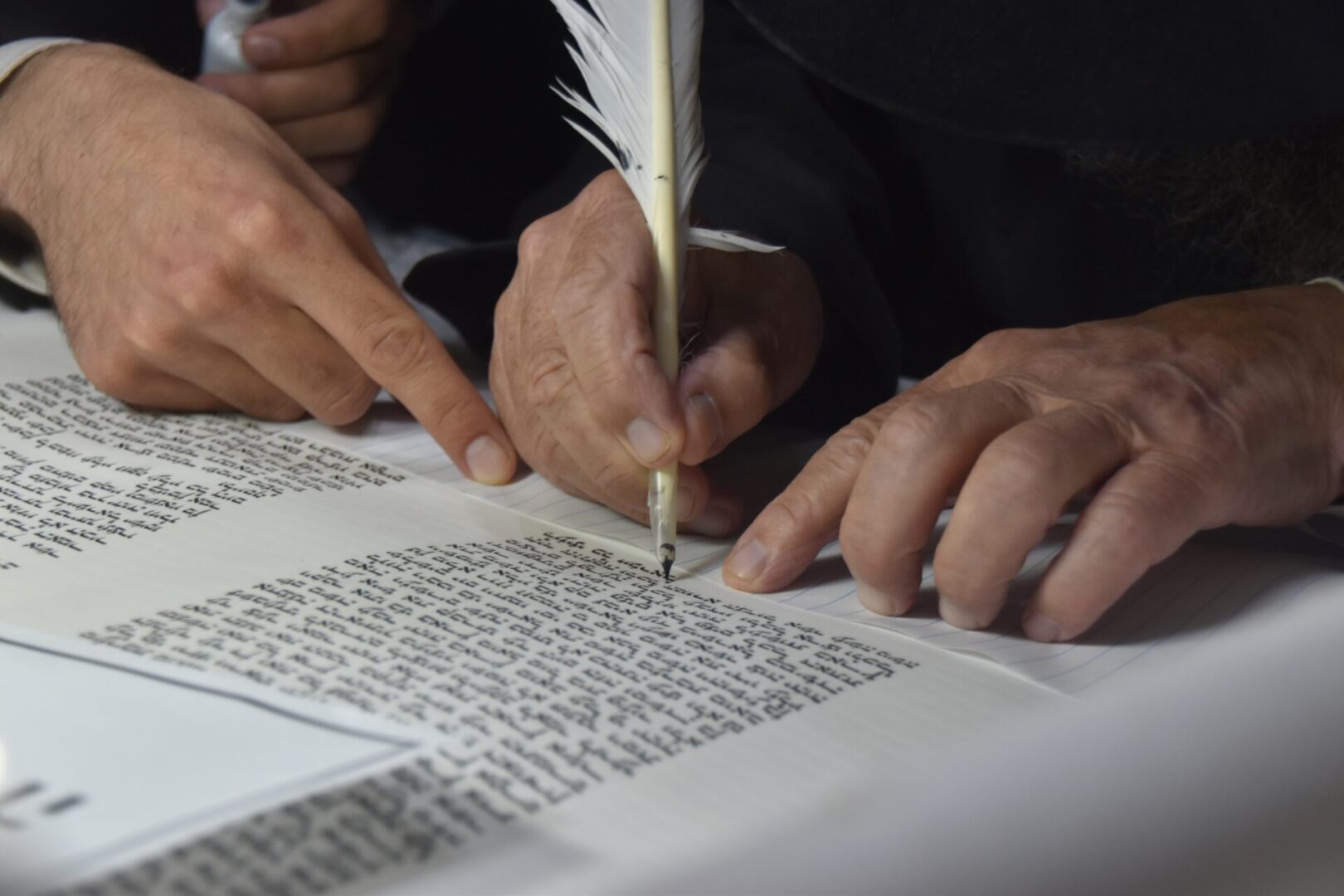 A,Hand,Writes,Letters,In,The,Sefer,Torah,,The,Holiest